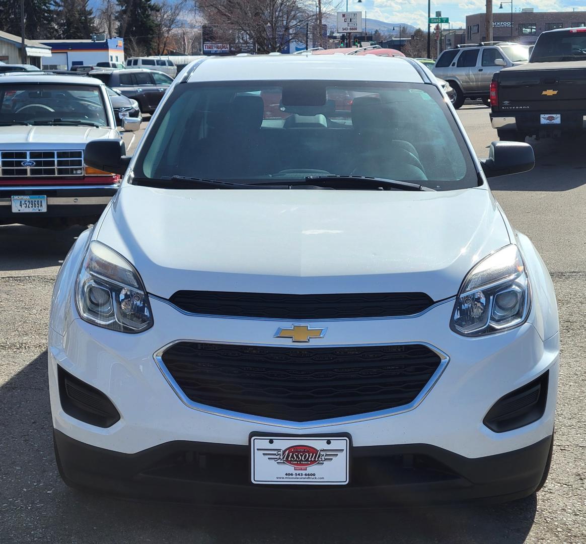 2017 White /Black Chevrolet Equinox LS 2WD (2GNALAEK3H1) with an 2.4L L4 DOHC 16V FFV engine, 6A transmission, located at 450 N Russell, Missoula, MT, 59801, (406) 543-6600, 46.874496, -114.017433 - Nice Front Wheel Drive SUV. 2.4L I4 Engine. 6 Speed Automatic Transmission. Bluetooth. Backup Camera. Air. Cruise. Tilt. Power Windows and Locks. - Photo#6